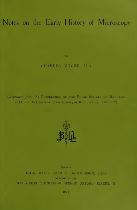 A green book with black text
Description automatically generated