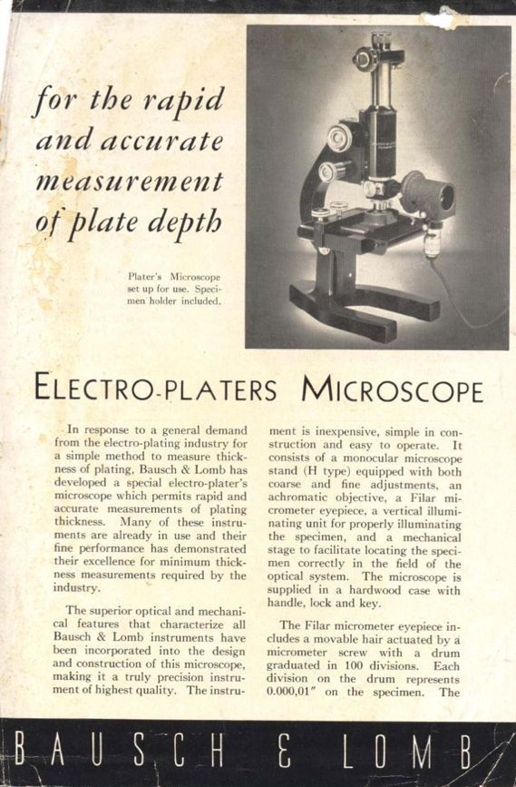 A close-up of a microscope
Description automatically generated