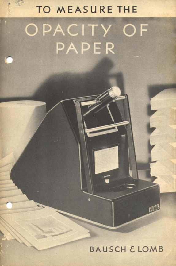 A black and white photo of a machine
Description automatically generated