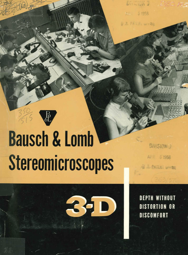 A black and white photo of people working in a lab
Description automatically generated