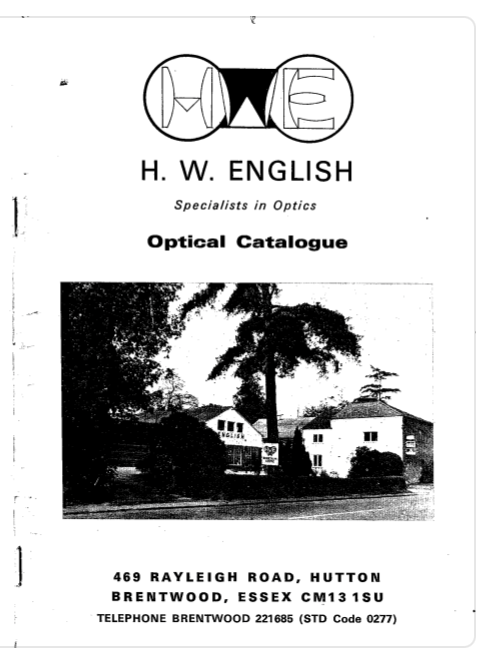 A black and white photo of a house
Description automatically generated