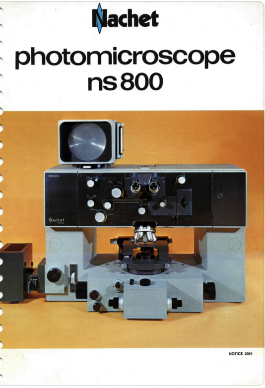 A close-up of a microscope
Description automatically generated