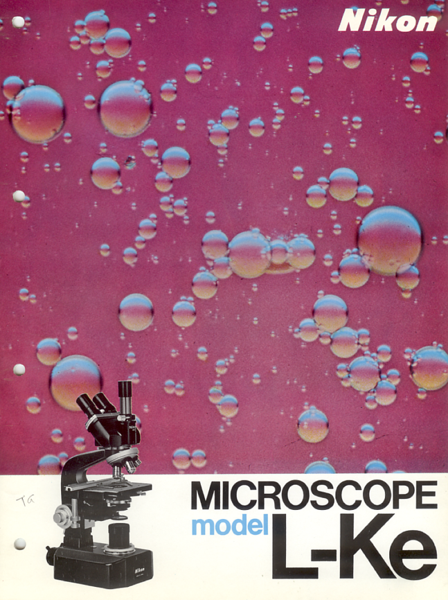 A cover of a microscope
Description automatically generated