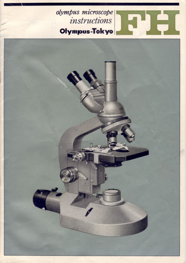 A close-up of a microscope
Description automatically generated