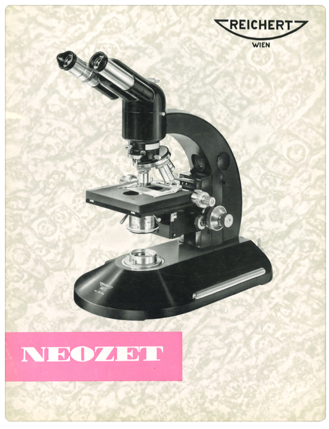 A black and white photo of a microscope
Description automatically generated