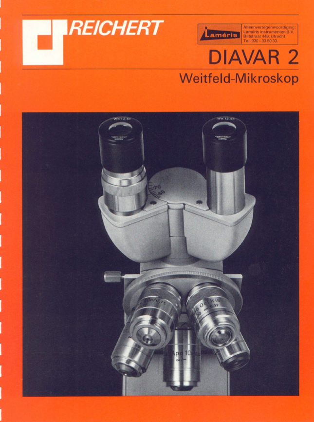 A close-up of a microscope
Description automatically generated