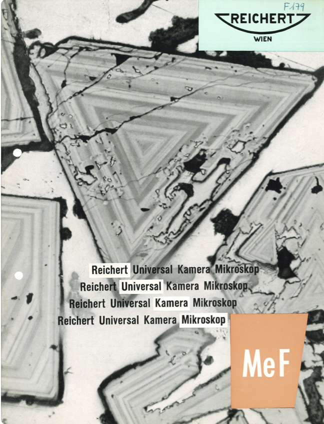 A close-up of a cover
Description automatically generated