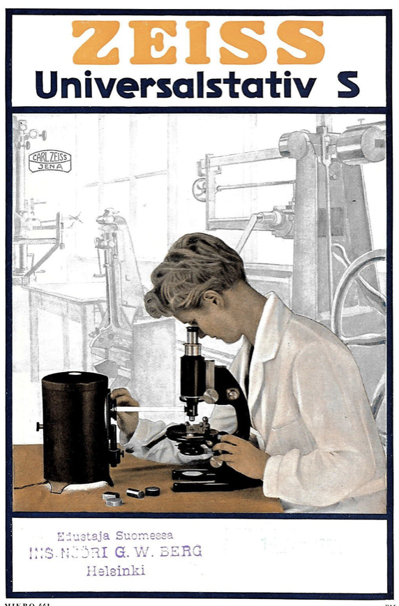 A person using a microscope
Description automatically generated