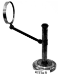 A magnifying glass on a metal stand
Description automatically generated with medium confidence