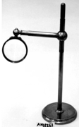 A magnifying glass on a stand
Description automatically generated with medium confidence