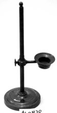 A picture containing circle, still life photography, pole
Description automatically generated