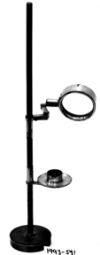 A magnifying glass on a stand
Description automatically generated with medium confidence