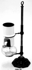 A picture containing cylinder, coffee, indoor, pole
Description automatically generated
