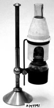 A picture containing lamp, cylinder, indoor, pole
Description automatically generated