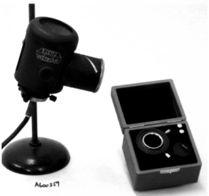 A close-up of a microscope
Description automatically generated with low confidence