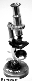 A close-up of a microscope
Description automatically generated