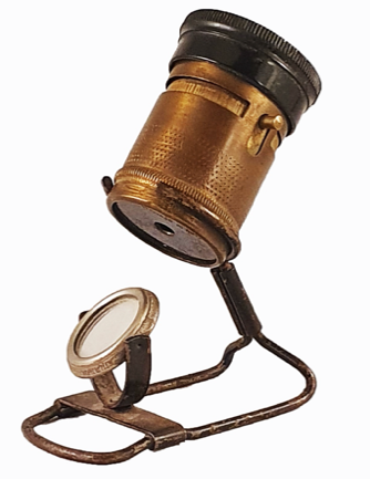 A picture containing object, sitting, table, light
Description automatically generated